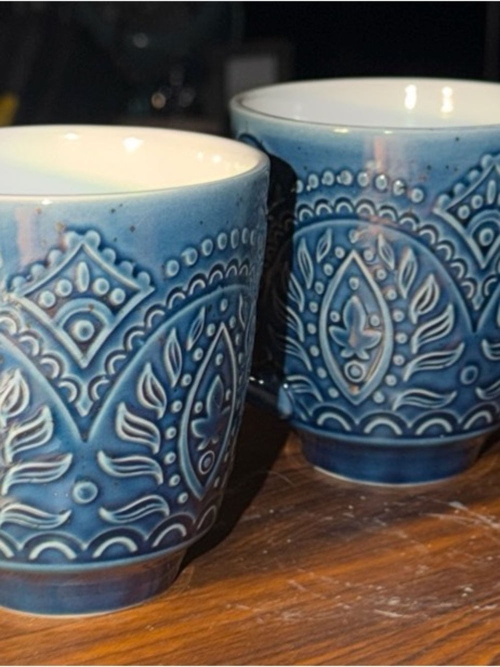 Elama Petra stoneware mugs in navy blue featuring a deep embossed pattern